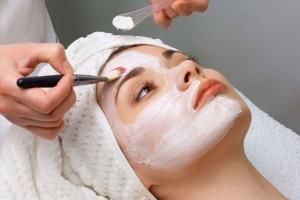 Chemical peeling is done to a girl in the salon