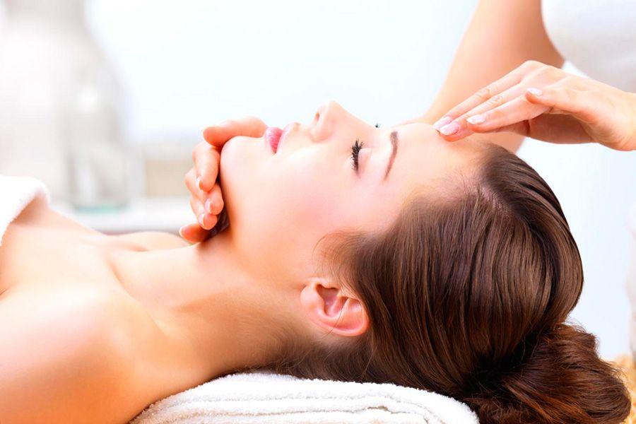 Woman lies on a procedure in a beauty salon