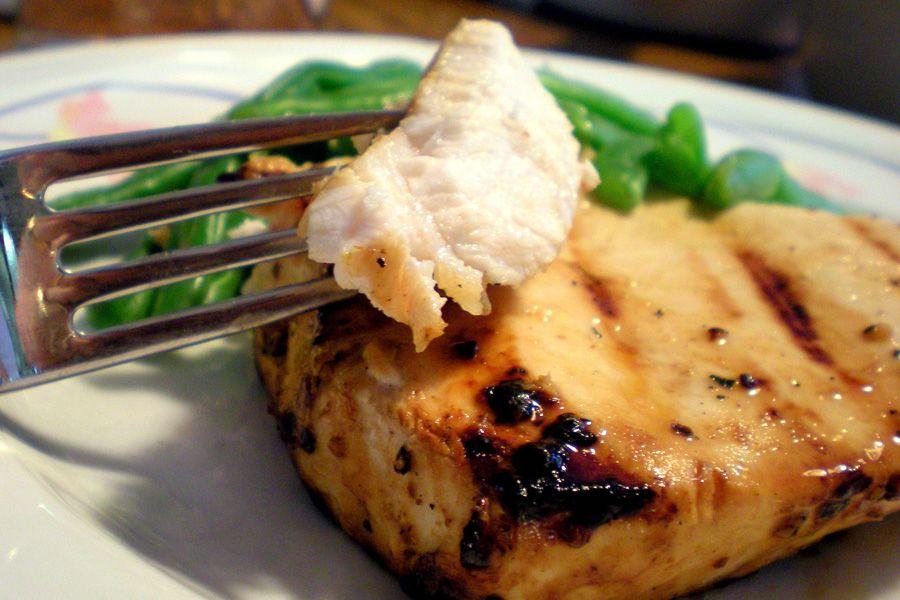 Common carp on a plate with herbs