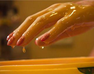 Female hands in paraffin