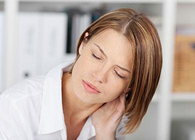 The girl has a sore neck