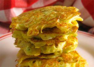 Zucchini fritters with potato pyramid