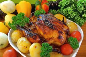 Chicken with apples, tomatoes and parsley