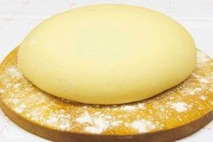 Finished dough on a cutting board