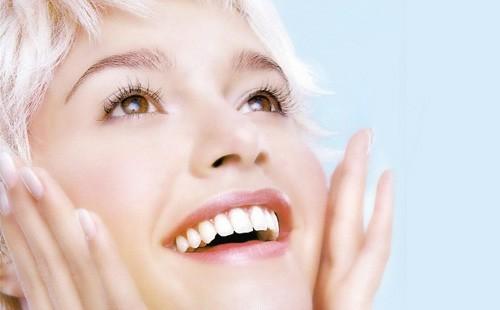 Girl with healthy white teeth.