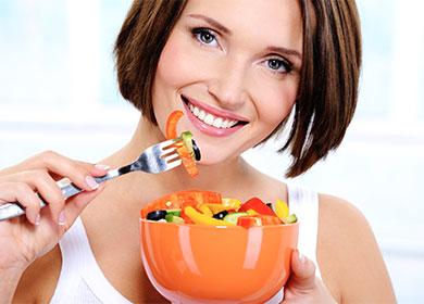 Girl eats vegetables