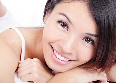 Beautiful girl with a snow-white smile