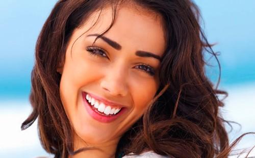 Girl with a beautiful snow-white smile