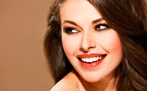 Beautiful girl with a snow-white smile