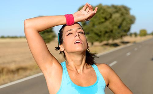 The girl is tired of the heat