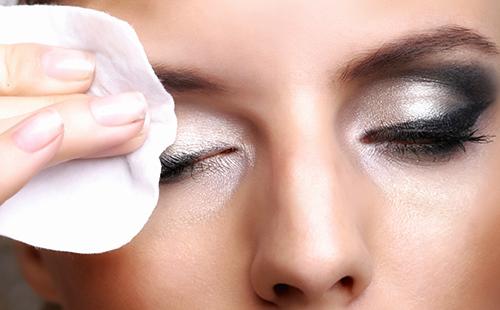 Girl removes makeup after a long day