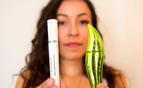 Girl holds out mascara