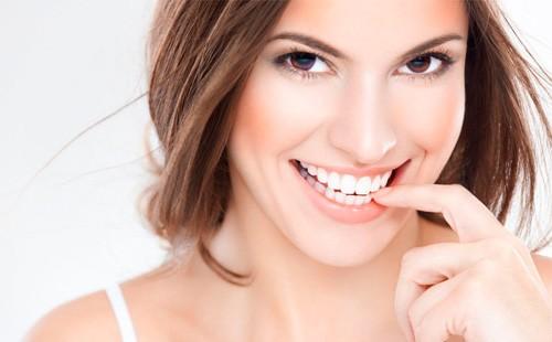 Girl with a perfect snow-white smile