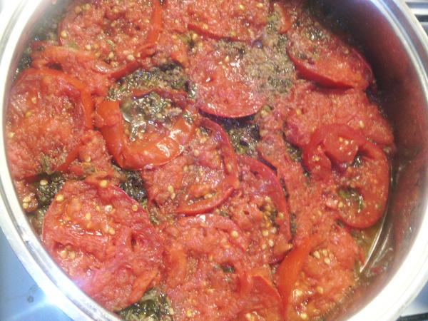 Top tomatoes in a pan