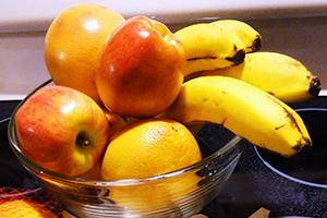 Bright fruits in a glass bowl