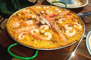 From the view of the fiery paella with seafood I want to dance flamenco