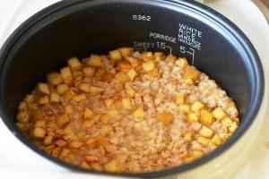 Porridge with apples is ready for laying out of the slow cooker