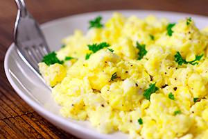 Omelet in a plate with a fork