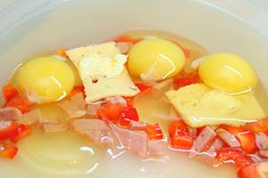 Fried eggs with cheese in a slow cooker