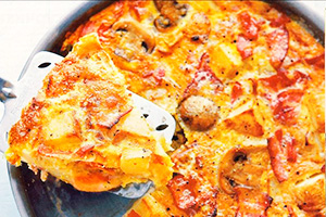Omelet with potatoes, bacon and mushrooms
