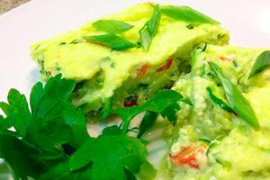 Omelet with zucchini and tomatoes