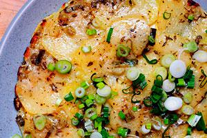 Zucchini and potato casserole with herbs