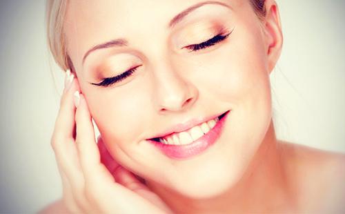 Smiling woman with radiant skin