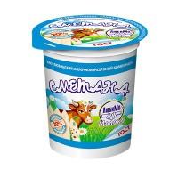 Jar of sour cream with a painted cow