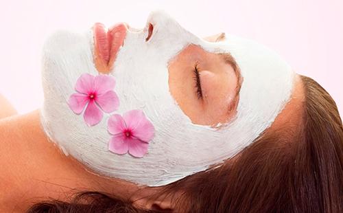 Girl with pink violets on her cheeks