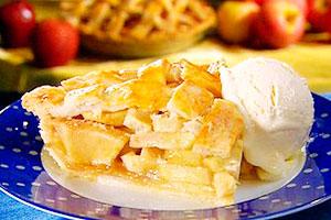 Charlotte with apples, bananas and nuts