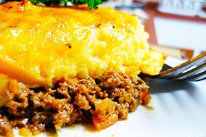 Slice of potato casserole with minced meat