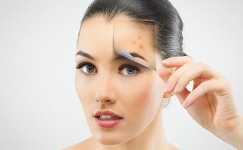 Girl removes spots from her forehead with one wave of her hand