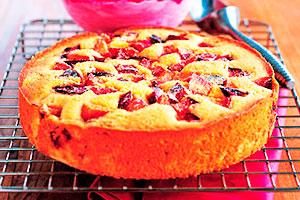 Charlotte with plums and rum