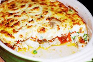 Mashed potato casserole with mushrooms and chicken