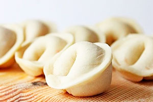 Egg dumplings in water with eggs