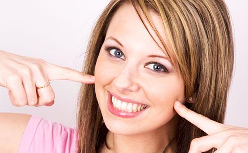 Girl shows on cheeks