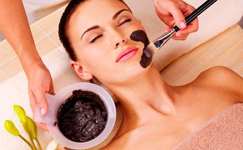 Applying a black mask to the face