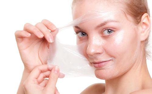 Girl removes the mask from the face