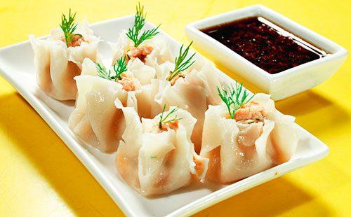 Japanese dumplings on a white plate