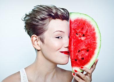 Girl with a half of watermelon