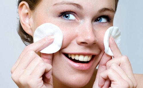 Girl with cotton pads