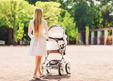 Young woman with a stroller