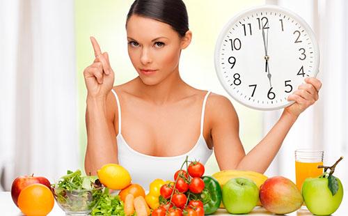 Girl with a clock in hand