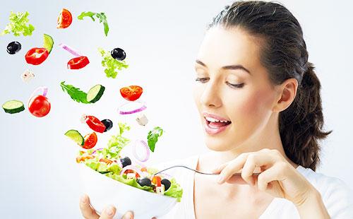Girl eating salad