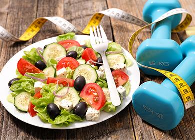 Vegetable salad and dumbbell