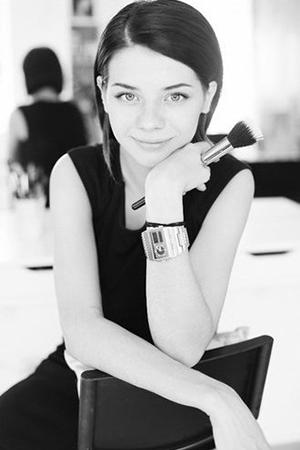 Black and white portrait with a brush