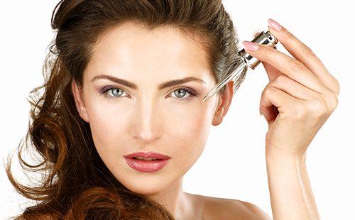 Dark-haired beauty with a dropper