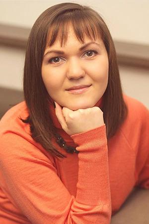 Portrait in a coral sweater