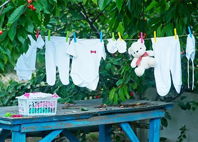 Baby things are dried on a rope