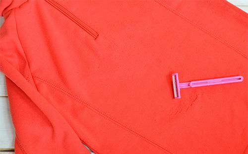 Disposable razor on a sweater